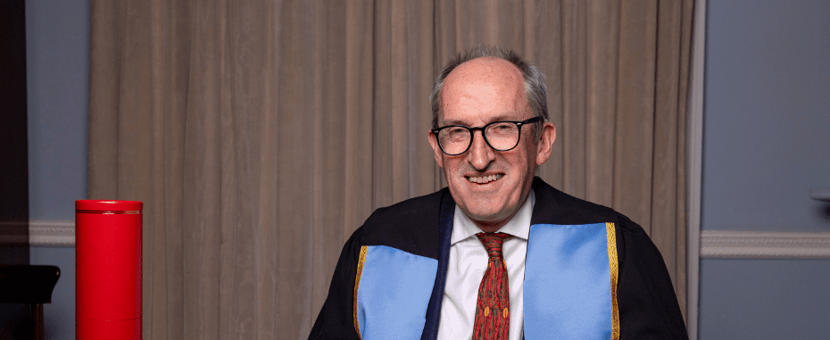 Mike McKirdy signing Honorary Fellows book